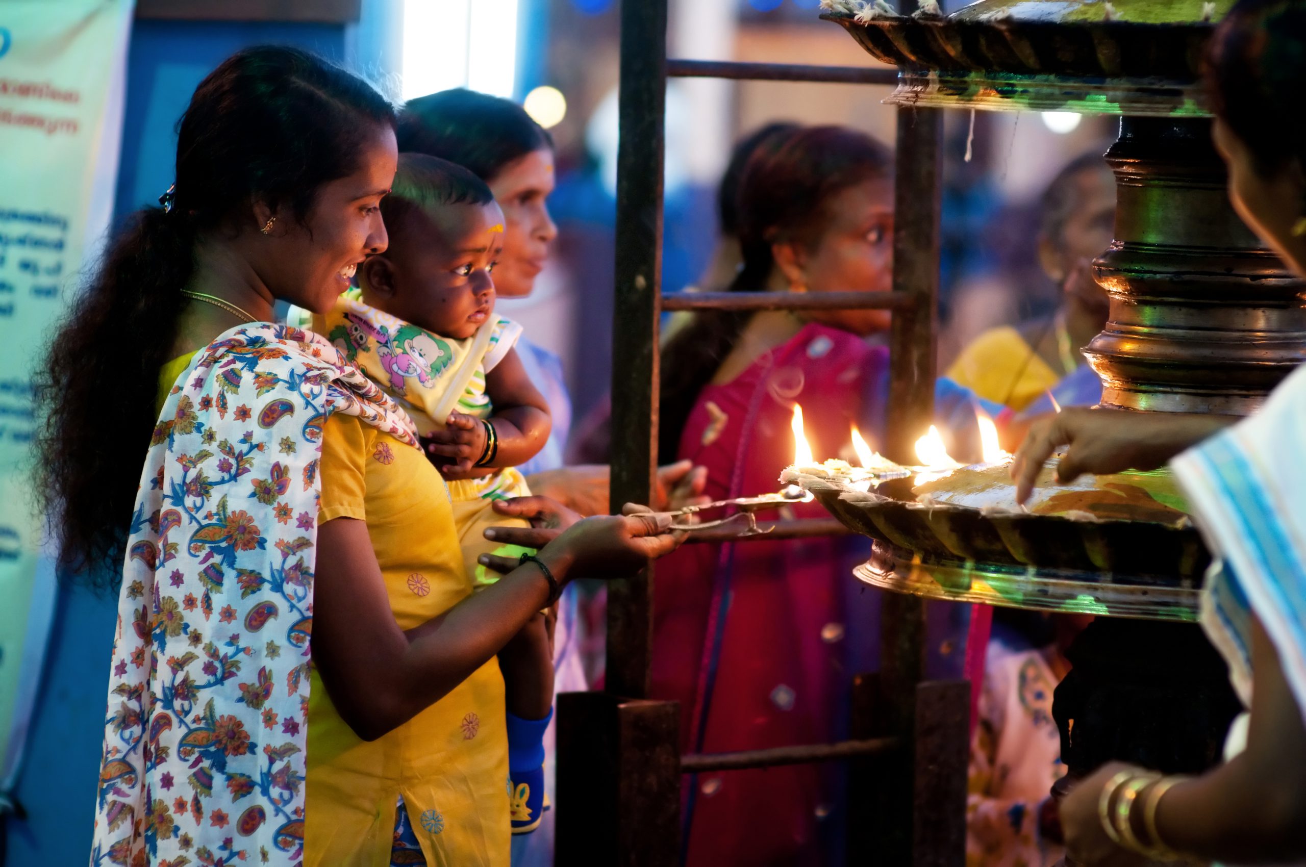 Young woman with child in the temple